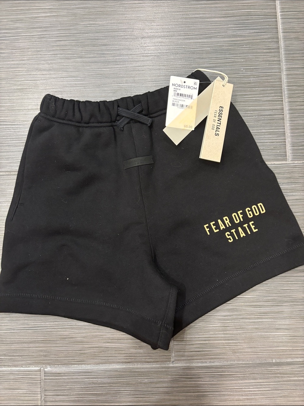 Essentials Kids Black Shorts with Gold 'Fear of God State' Logo